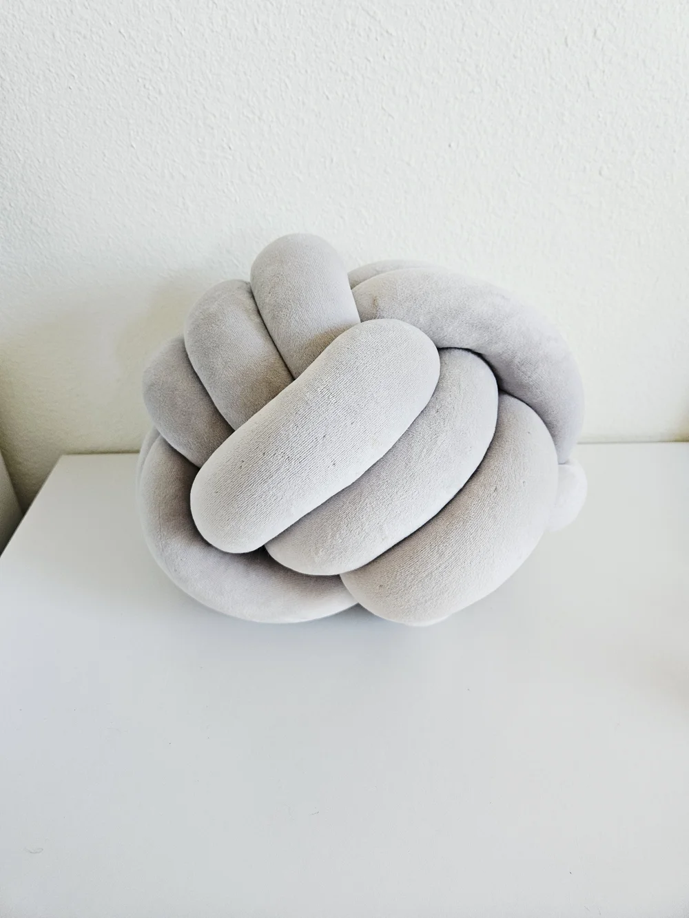 Plush Knot Throw Pillow in Light Gray